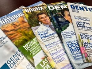 A selection of Custom Dental Magazines that Gilleard Dental Marketing produces