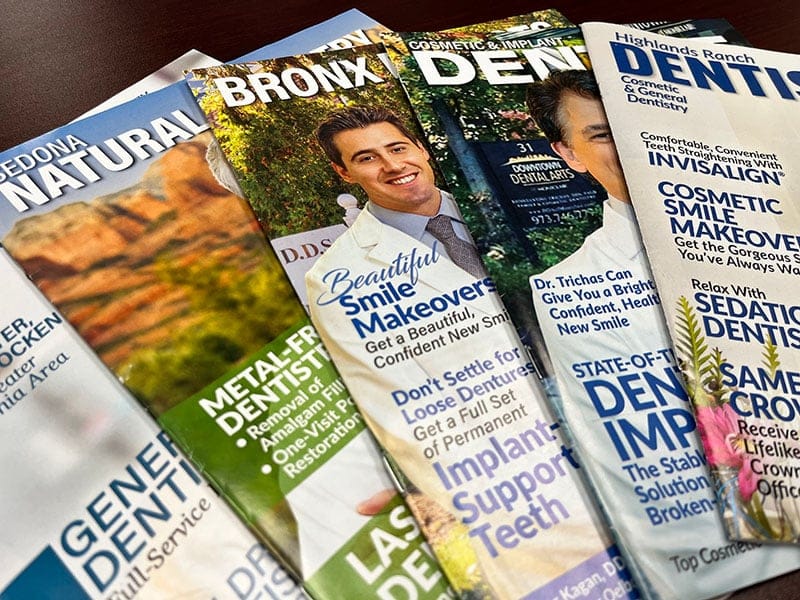 A selection of Custom Dental Magazines that Gilleard Dental Marketing produces