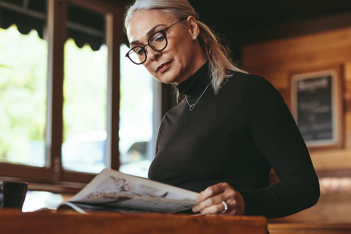 A woman reading a magazine