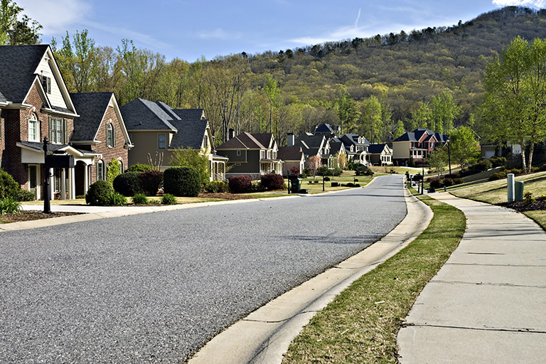 View of a row of houses as seen from the street in an upscale neighborhood