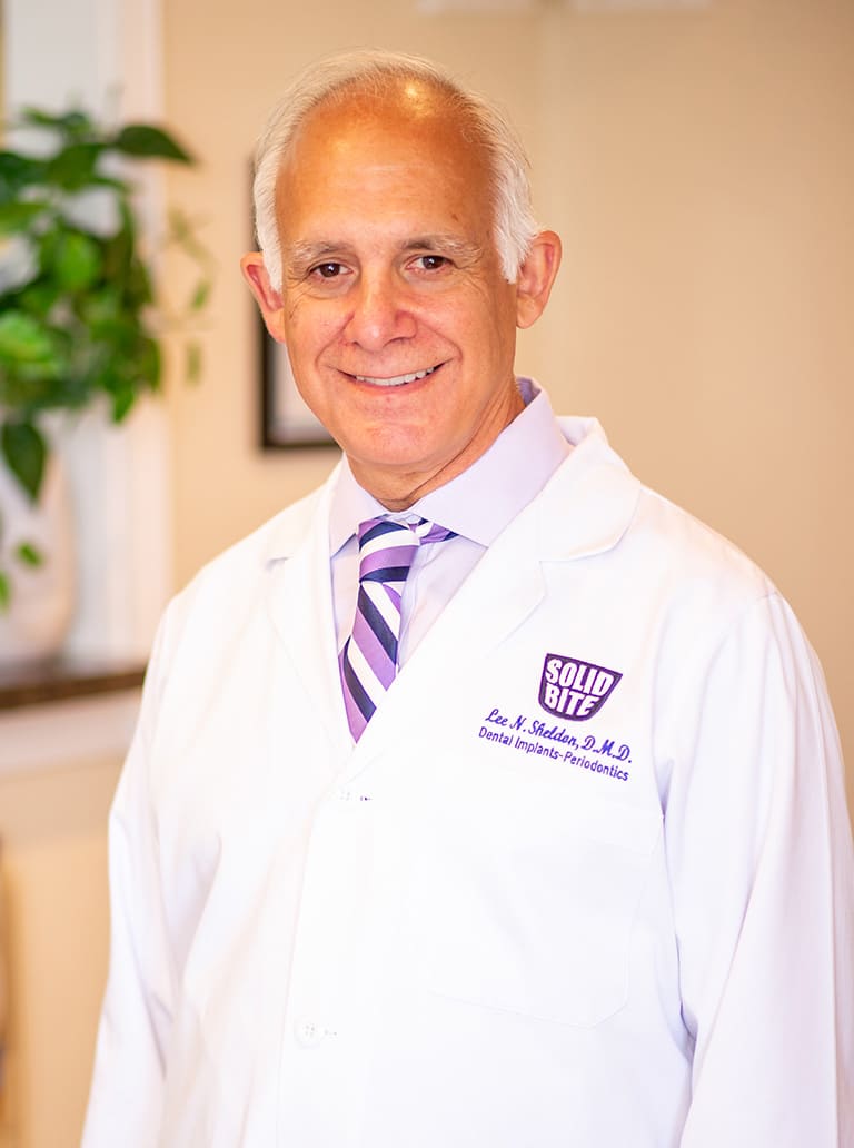 Portrait image of Dr. Lee Sheldon and his success with Magazine dental marketing.